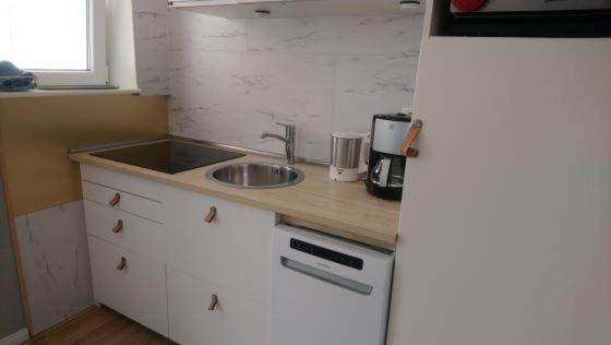 Ferienwohnung Am Strandweg โฮวัคท์ ภายนอก รูปภาพ